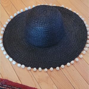 MARCUS ADLER RAFFIA BLACK HAT WITH WHITE POM POMS